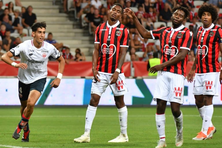 Nice players look on in disgust after Nayef Aguerd's opening goal for Dijon