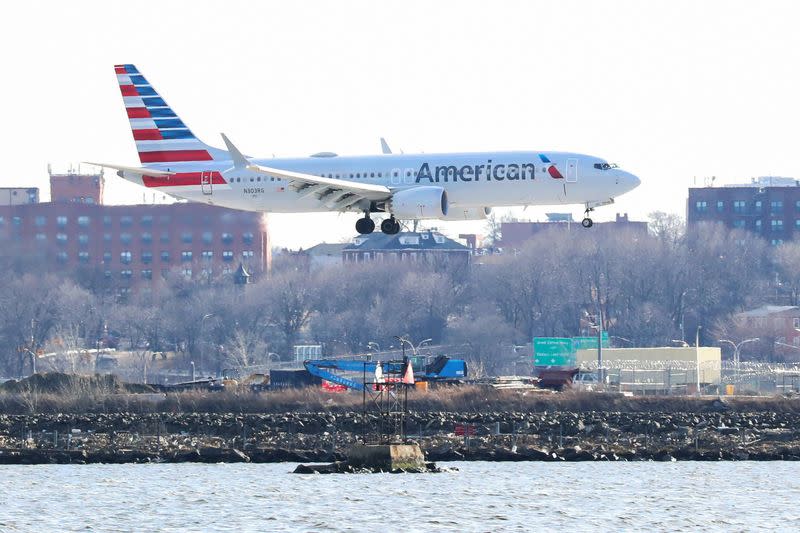 FILE PHOTO: An American Airlines Boeing 737 MAX 8 comes in for landing at LaGuardia Airport in New York