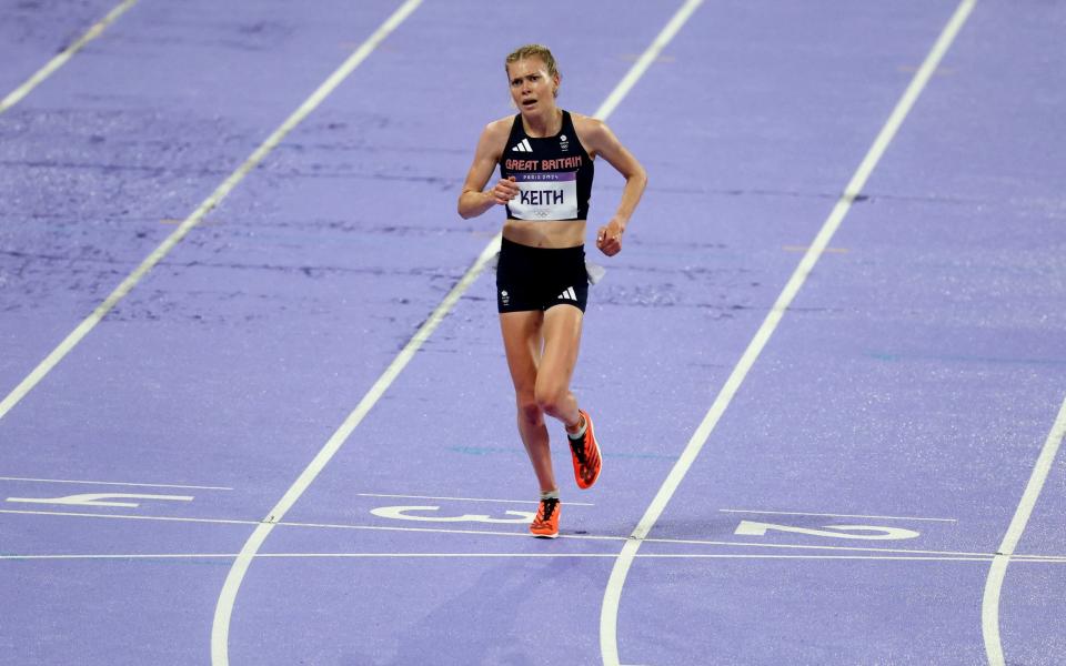 Megan Keith is cheered round by the crowd