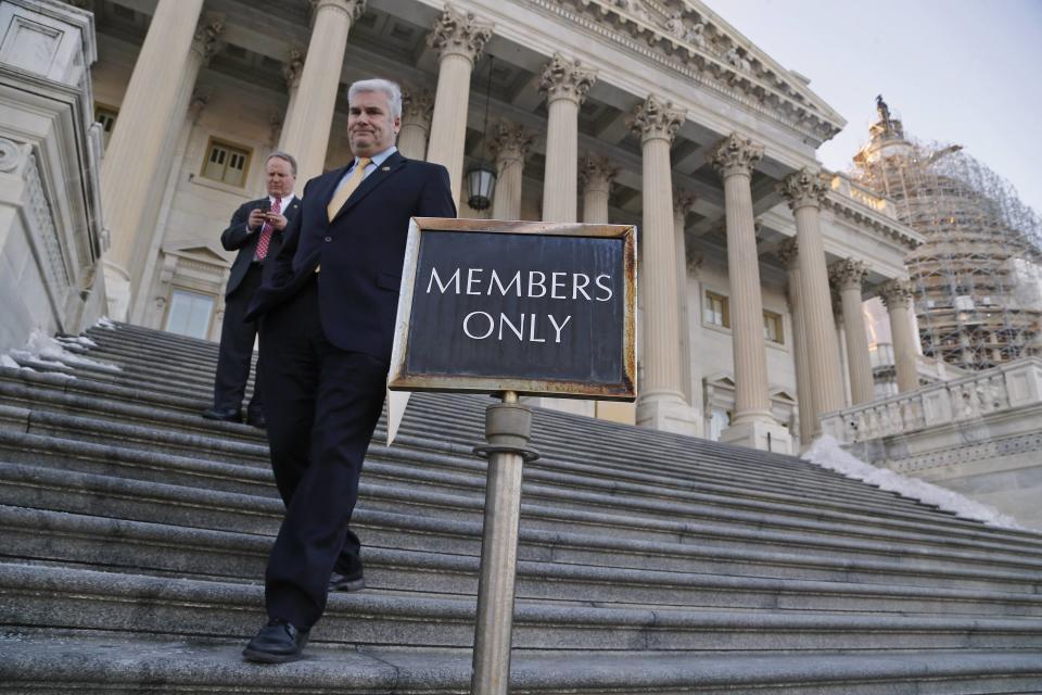 Members of the House of Representatives depart the House floor to an outdoor exit after a failed afternoon vote on a measure to fund the Department of Homeland Security at the Capitol in Washington, February 27, 2015. The House of Representatives on Friday failed to approve a stopgap funding bill for the U.S. domestic security agency, increasing the threat of a partial agency shutdown at midnight. REUTERS/Jonathan Ernst (UNITED STATES - Tags: POLITICS)