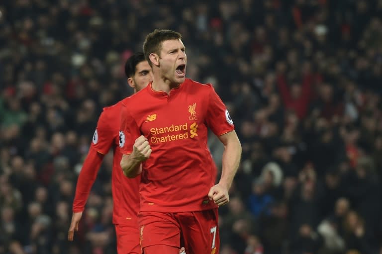 Liverpool's English midfielder James Milner celebrates scoring their second goal during the English Premier League football match between Liverpool and Sunderland on November 26, 2016