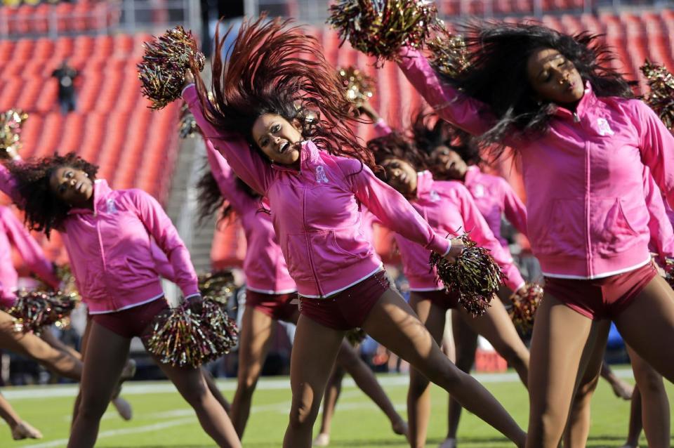 <p>Washington Redskins cheerleaders perform before an NFL football game between the Redskins and the Philadelphia Eagles, Sunday, Oct. 16, 2016, in Landover, Md. (AP Photo/Mark Tenally) </p>