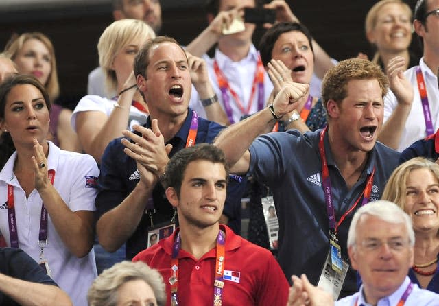The Duke and Duchess of Cambridge cheer on Great Britain with Prince Harry (right)