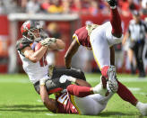 <p>Tampa Bay Buccaneers wide receiver Adam Humphries (10) is tackled during the first half of an NFL game between the Washington Redskins and the Tampa Bay Bucs on November 11, 2018, at Raymond James Stadium in Tampa, FL. (Photo by Roy K. Miller/Icon Sportswire via Getty Images) </p>