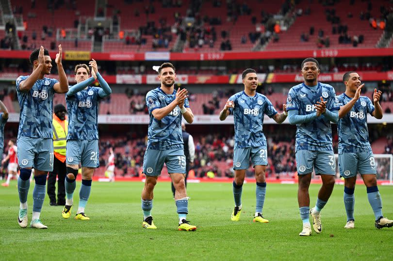 Aston Villa players show their appreciation to the fans after beating Arsenal