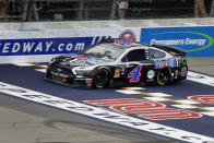 Kevin Harvick crosses the finish line to win a NASCAR Cup Series auto race at Michigan International Speedway in Brooklyn, Mich., Sunday, Aug. 11, 2019. (AP Photo/Paul Sancya)