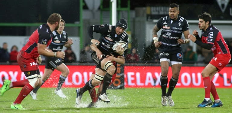 Brive's number eight Petrus Hauman (C) runs with the ball during the French Top 14 rugby union match against Toulon on March 4, 2017