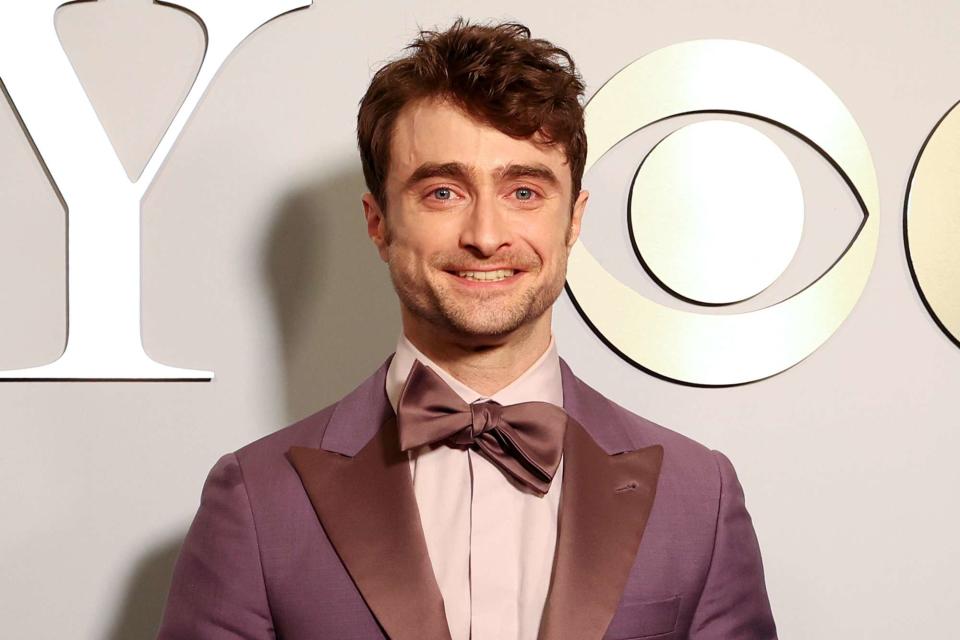 <p>Kevin Mazur/Getty</p> Daniel Radcliffe at The 77th Annual Tony Awards 