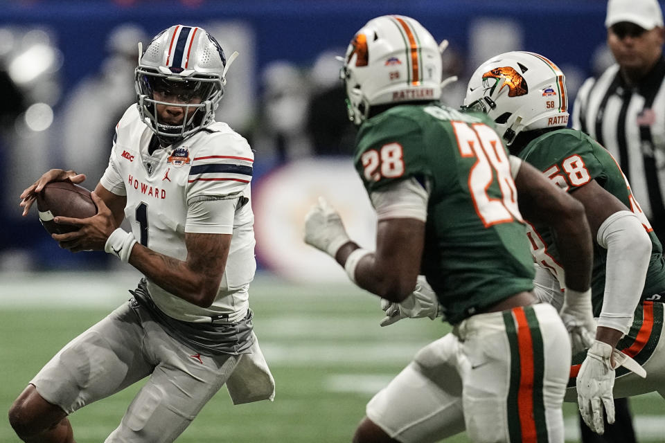 Howard quarterback Quinton Williams (1) runs out of the pocket against Florida A&M during the first half of an NCAA Celebration Bowl football game, Saturday, Dec. 16, 2023, in Atlanta. (AP Photo/Mike Stewart)