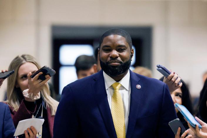 Congressional reporters trail Republican Rep. Byron Donalds of Florida as he makes his way to a House Republican Caucus meeting at the US Capitol on November 14, 2022 in Washington, DC.