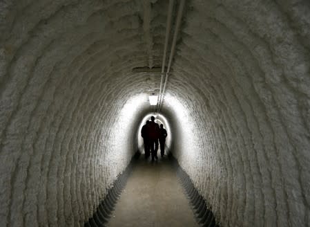 FILE PHOTO: General Electric employees walk out of a bunker at the GE Aviation Peebles Test Operations Facility in Peebles, Ohio