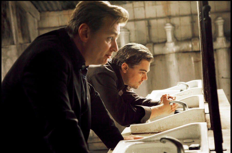 Christopher Nolan with Leonardo DiCaprio on the set of his 2010 mind-bending sci-fi thriller Inception. (Alamy/WB)