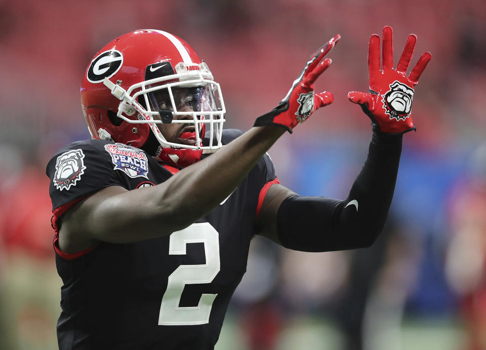Georgia defensive back Richard LeCounte, who was injured in a motorcycle accident earlier in the season, prepares to play Cincinnati in the NCAA college football Peach Bowl game on Friday, Jan. 1, 2021, in Atlanta. (Curtis Compton/Atlanta Journal-Constitution via AP)