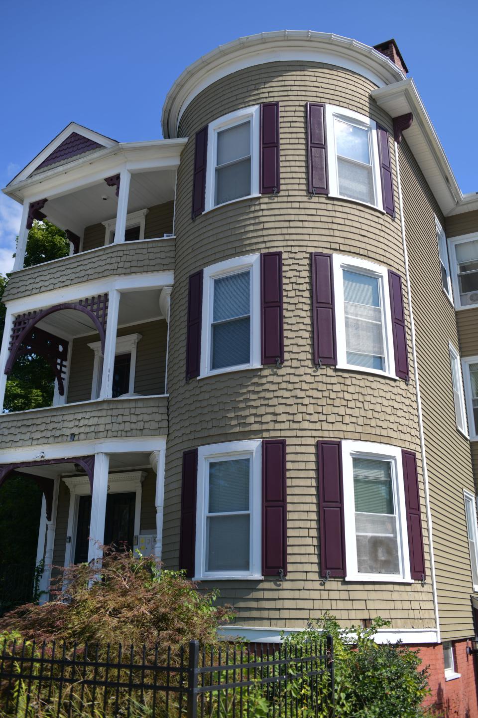 A renovated three-decker at 913 Main St. in Worcester with its so-called balloon frame construction.