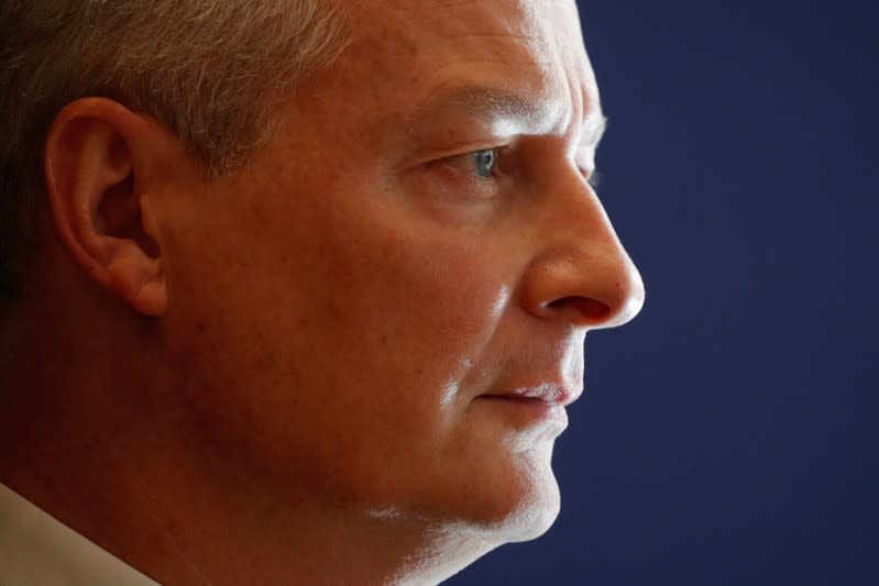 FILE PHOTO: French Finance Minister Bruno Le Maire attends a news conference to release the Folz report about EDF's long-delayed Flamanville nuclear plant, at the Bercy Finance Ministry in Paris