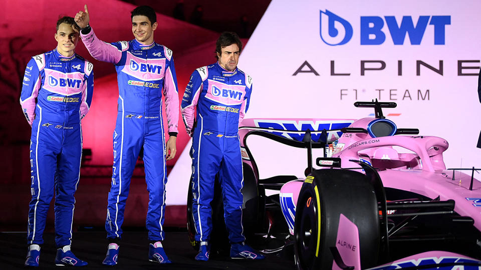 F1 drivers Oscar Piastri, Esteban Ocon and Fernando Alonso are pictured at Alpine's 2022 season launch.
