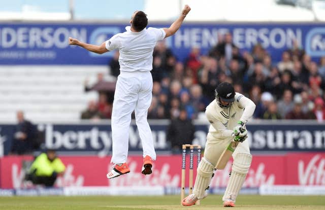 England’s James Anderson leaps with joy after dismissing New Zealand’s Martin Guptill on a rain-affected day at Headingley