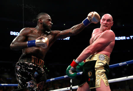 Boxing - Deontay Wilder v Tyson Fury - WBC World Heavyweight Title - Staples Centre, Los Angeles, United States - December 1, 2018 Deontay Wilder in action against Tyson Fury Action Images via Reuters/Andrew Couldridge