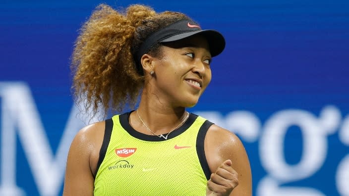 This August photo shows tennis star Naomi Osaka celebrating her win against Marie Bouzkova after their Women’s Singles first-round match on Day One of the 2021 U.S. Open. (Photo: Sarah Stier/Getty Images)