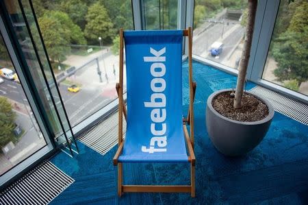 A picture shows the Facebook logo on a beach chair at the Facebook office in Berlin, Germany, August 29, 2016. REUTERS/Stefanie Loos