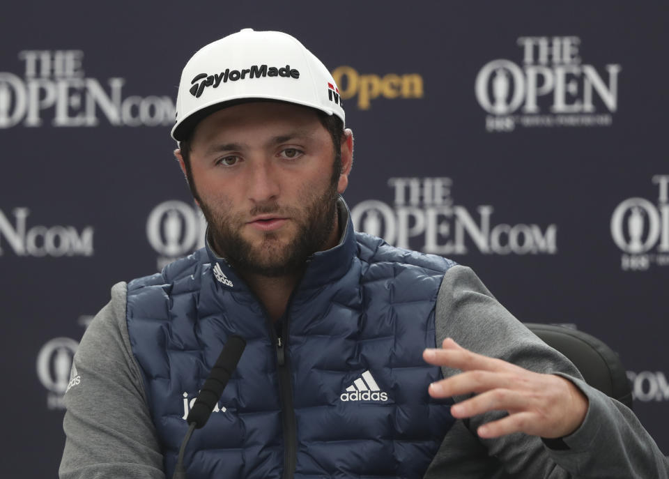 Spain's Jon Rahm answers a question from the media during a press conference ahead of the start of the British Open golf championships at Royal Portrush in Northern Ireland, Wednesday, July 17, 2019. The British Open starts Thursday. (AP Photo/Jon Super)