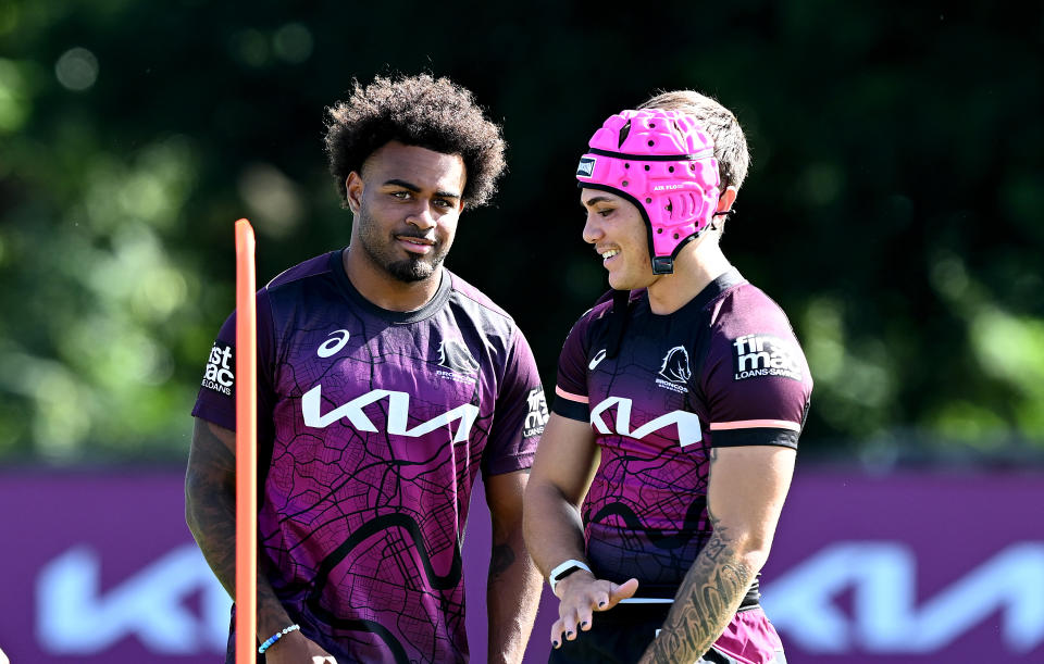 BRISBANE, AUSTRALIA - APRIL 08: Reece Walsh and Ezra Mam are seen during a Brisbane Broncos NRL training session at Clive Berghofer Field on April 08, 2024 in Brisbane, Australia. (Photo by Bradley Kanaris/Getty Images)