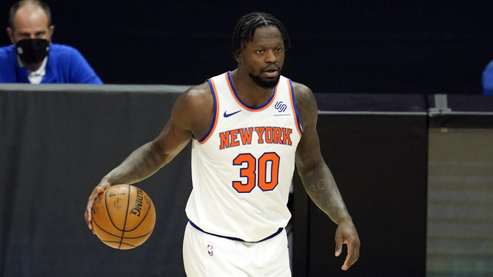 New York Knicks forward Julius Randle dribbles during an NBA basketball game against the Los Angeles Clippers Sunday, May 9, 2021, in Los Angeles. (AP Photo/Marcio Jose Sanchez)