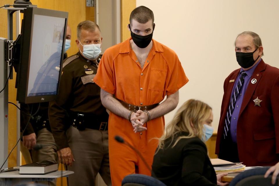 Robert Pavao walks into Rockingham Superior Court Wednesday, Nov. 3, 2021, where he was sentenced to 55 years to life in prison for killing an Exeter woman at Timberland in Stratham in 2020.