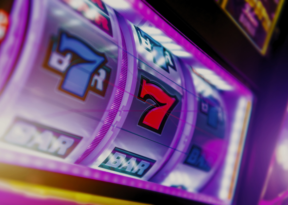  A closeup of a slot machine with the number 7 on it.