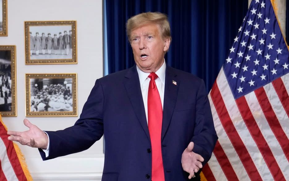 Donald Trump speaks to the media at a Washington hotel on Tuesday