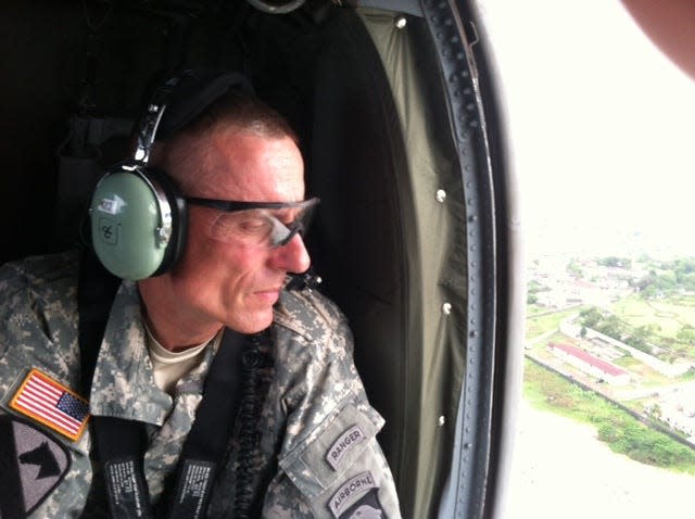 Maj. Gen. Gary Volesky flies over Liberia.