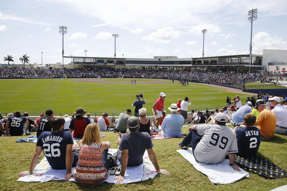 WEST PALM BEACH, FLORIDA - MARCH 12:  Fans attend a Grapefruit League spring training game between the Washington Nationals and the New York Yankees at FITTEAM Ballpark of The Palm Beaches on March 12, 2020 in West Palm Beach, Florida. Many professional and college sports are canceling or postponing their games due to the ongoing threat of the Coronavirus (COVID-19) outbreak. (Photo by Michael Reaves/Getty Images)