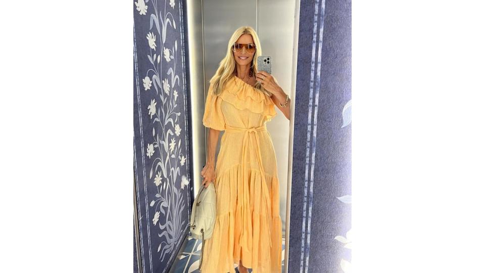 Tess Daly in a yellow ruffled dress