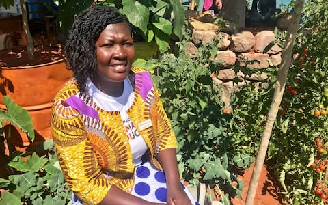 Clarah Zinyame, Camfed Alumnae Association (Cama) member and agricultural entrepreneur from Zimbabwe, at the garden in Chelsea - Credit: Telegraph