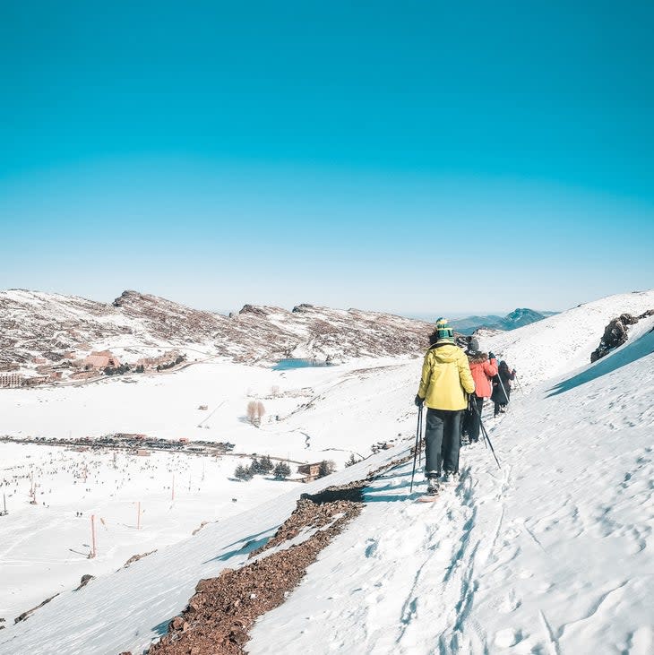 Skiers tackle the shoulder at Oukaimeden in Morocco.