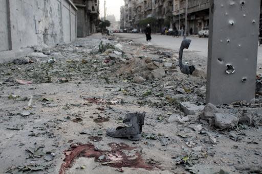 Restos de sangre entre las ruinas en Alepo, norte de Siria, el 6 de noviembre de 2013 (AFP | Karam al Masri)