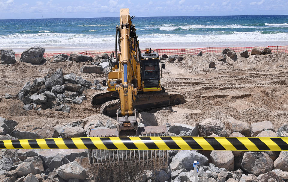 Seawall construction is seen on the Gold Coast before huge swells and high tides pummel southeast Queensland beaches. Source: AAP