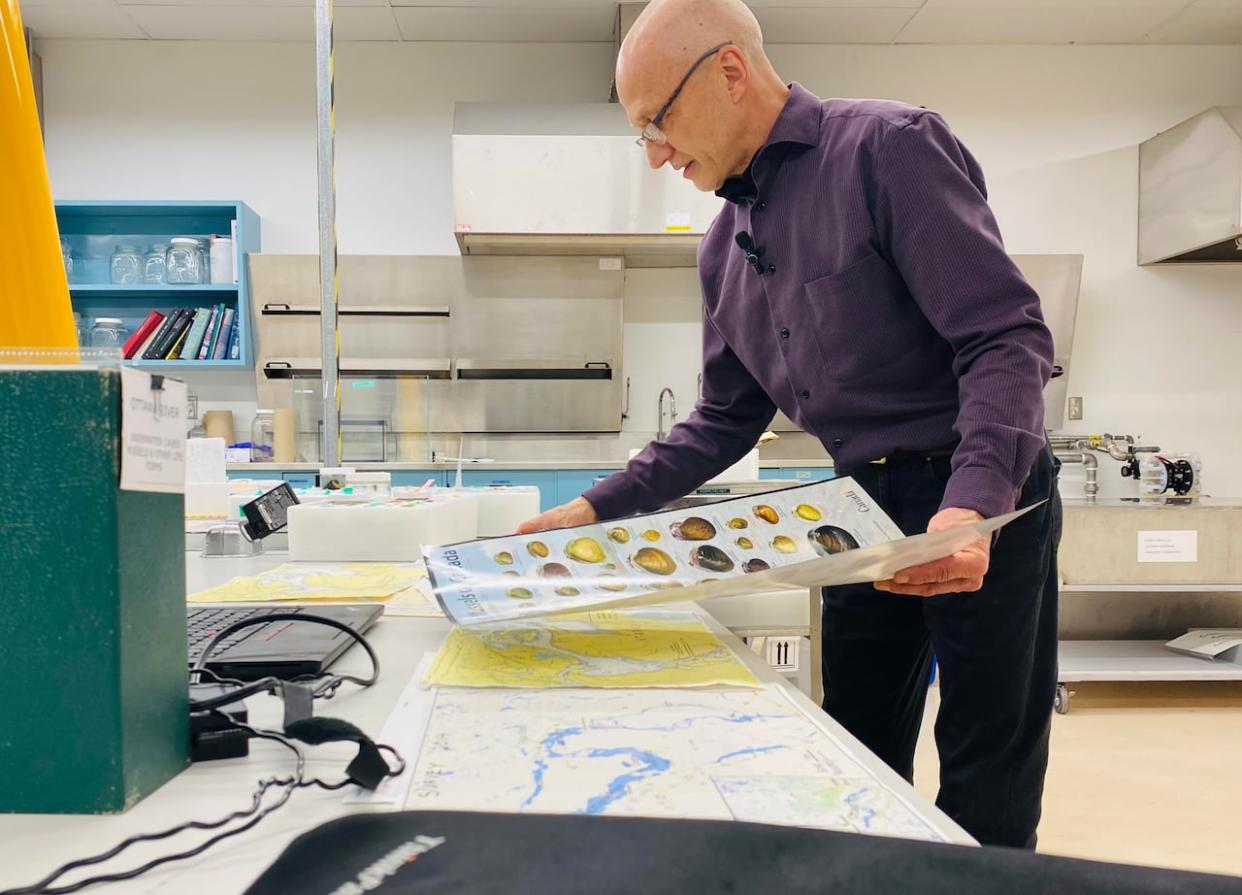 Scientist André Martel at his laboratory at the Canadian Museum of Nature. (Stu Mills/CBC - image credit)