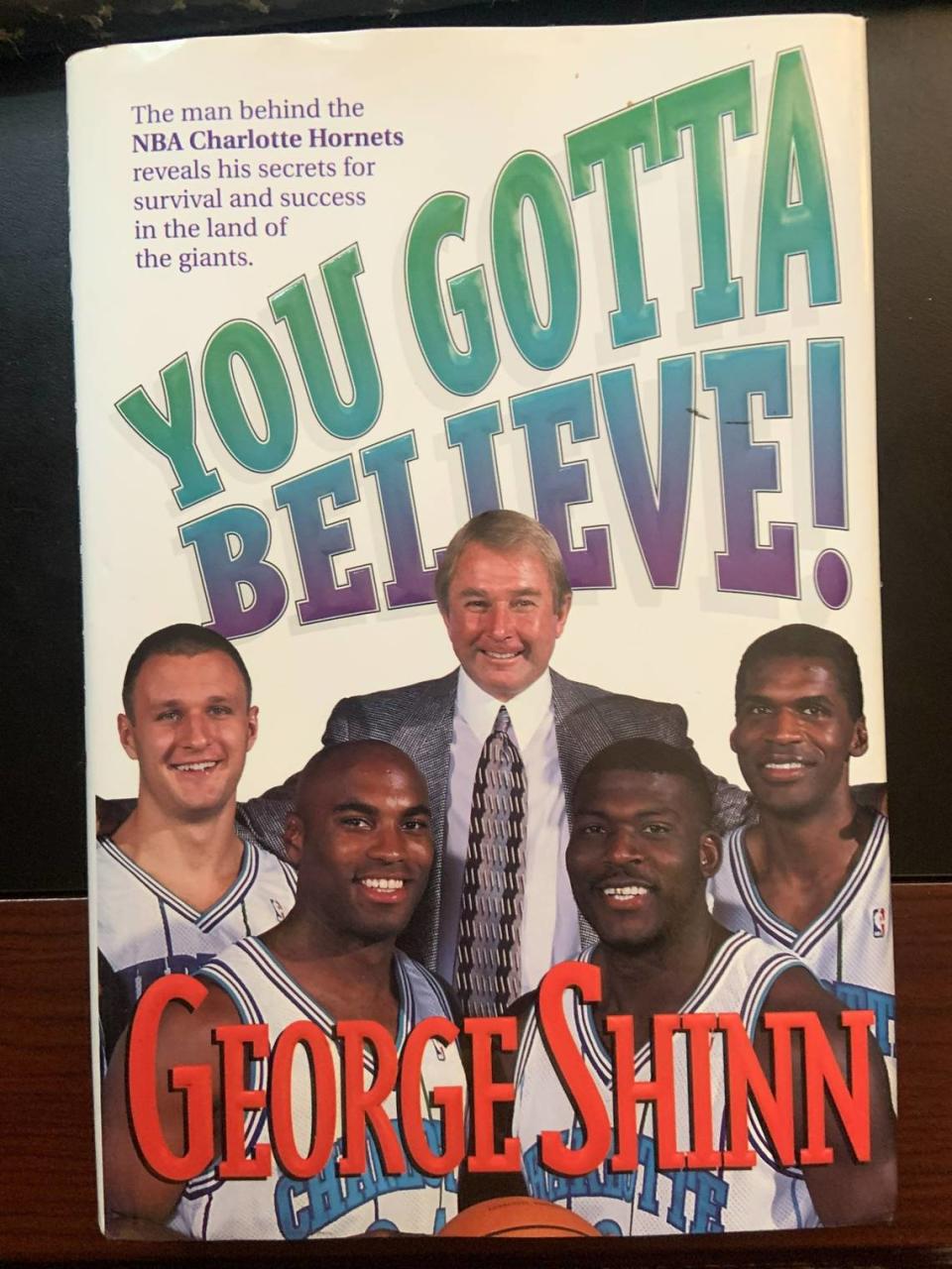 In 1996, when the Charlotte Hornets and owner George Shinn were both still popular in their home city, Shinn published an inspirational book called “You Gotta Believe!” To stand slightly above several of his players (including Larry Johnson, front right) for the cover photo, the 5-foot-6 Shinn used a stool.