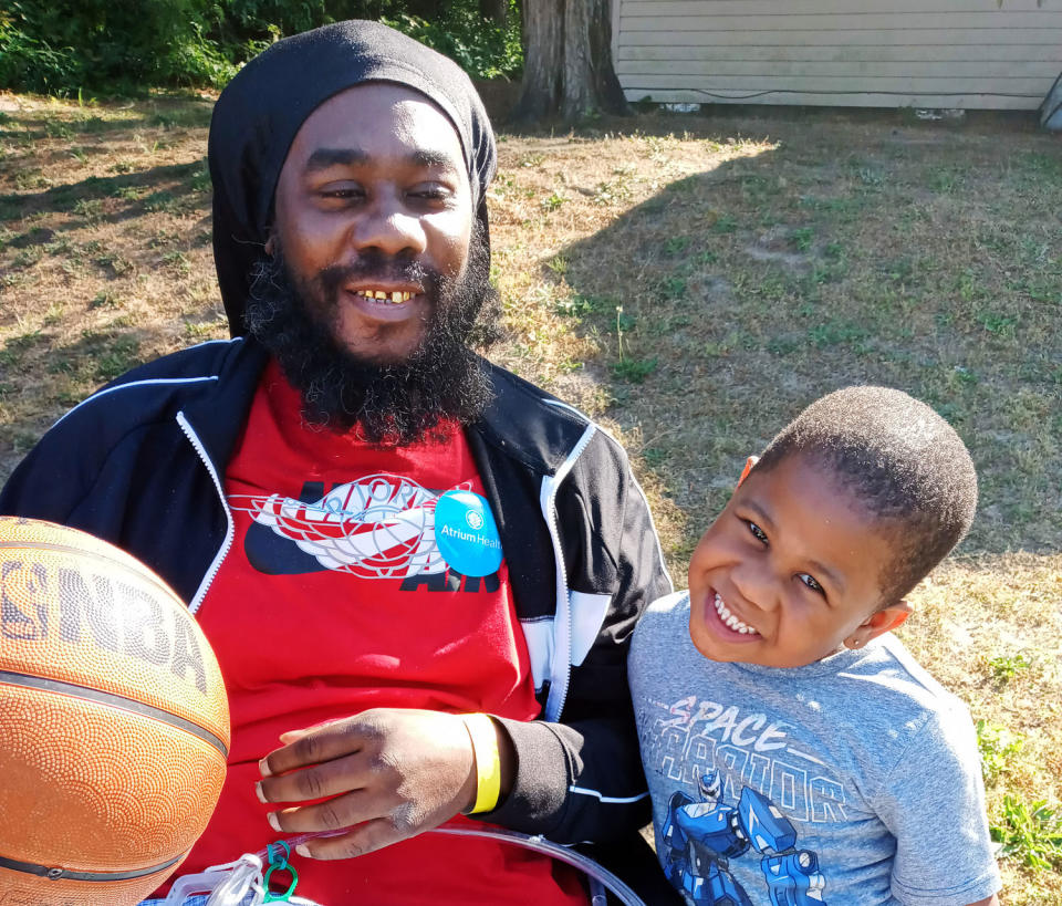 Tim Stephens and his son during his recovery. (Courtesy Hazel McPhatter)