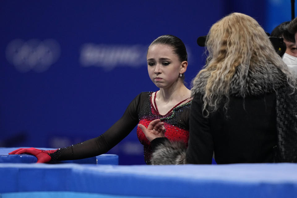 Kamila Valieva, of the Russian Olympic Committee, reacts after competing in the women's free skate program during the figure skating competition at the 2022 Winter Olympics, Thursday, Feb. 17, 2022, in Beijing. (AP Photo/David J. Phillip)