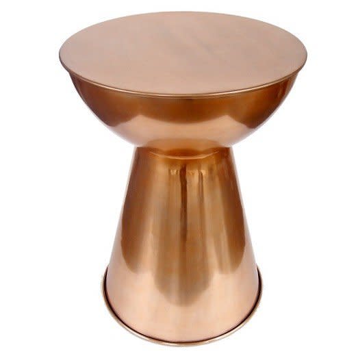 It's a minimalist's dream. <a href="https://www.target.com/p/hourglass-accent-table-white-threshold-153/-/A-16945436" target="_blank">Check it out here</a>.&nbsp;
