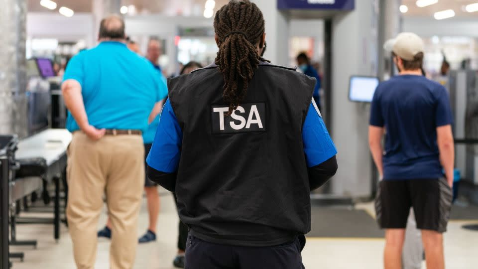 A TSA officer at Hartsfield-Jackson Atlanta International Airport in Atlanta in October 2023. - Elijah Nouvelage/Bloomberg/Getty Images