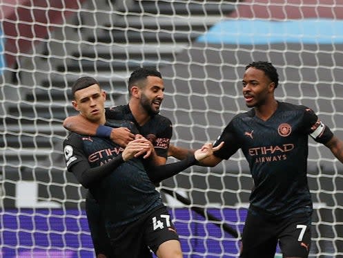 Phil Foden celebrates scoring the equalising goal  (Getty)