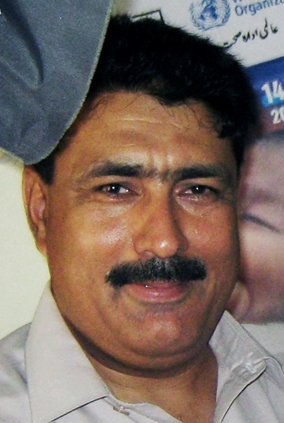 FILE - In this July 9, 2010 file photo, Pakistani Doctor Shakil Afridi is photographed in Pakistan's tribal area of Jamrud in Khyber region. The lawyer for Afridi who helped the U.S. find Osama bin Laden said Sunday, May 11, 2014 he wouldn't represent him any longer after facing threats from militants, even as America pushes for the man to be freed. (AP Photo/Qazi Rauf, File)