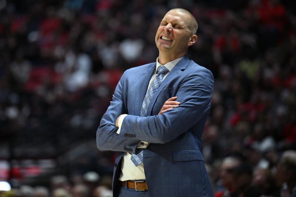 BYU basketball coach Mark Pope has been named the new head coach at Kentucky, the team he captained in the Wildcats' 1996 national championship season.