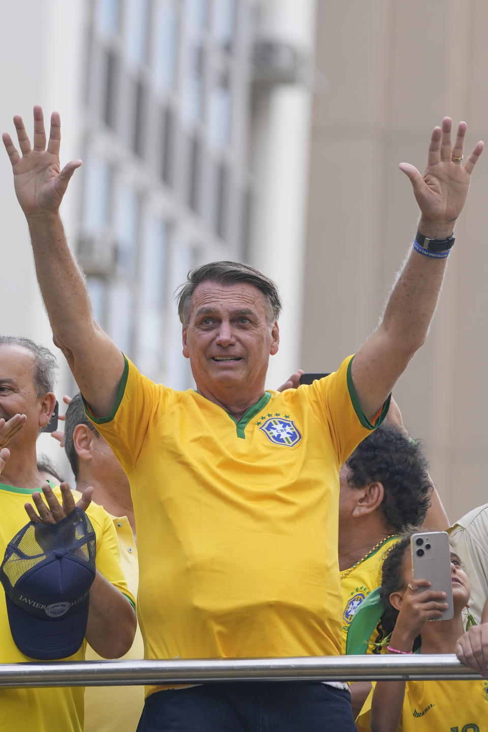 Former President Jair Bolsonaro addresses supporters during a rally in Sao Paulo., Brazil, Sunday, Feb. 25, 2024. Bolsonaro and some of his former top aides are under investigation into allegations they attempted plotted a coup to remove his successor, Luiz Inacio Lula da Silva. (AP Photo/Andre Penner)