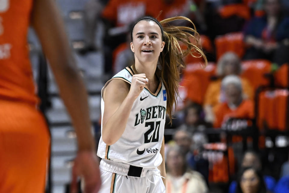 New York Liberty guard Sabrina Ionescu celebrates during Game 3 of the WNBA semifinals against the Connecticut Sun on Sept. 29, 2023, in Uncasville, Conn. (AP Photo/Jessica Hill)