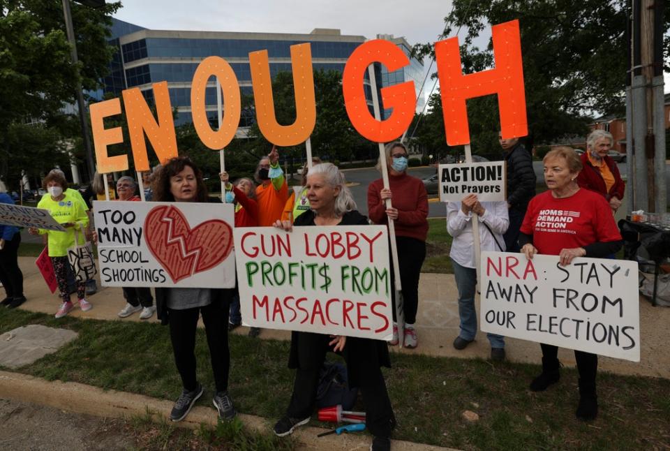 Gun-control advocates hold a vigil outside the National Rifle Association headquarters in Fairfax, Virginia (Getty Images)