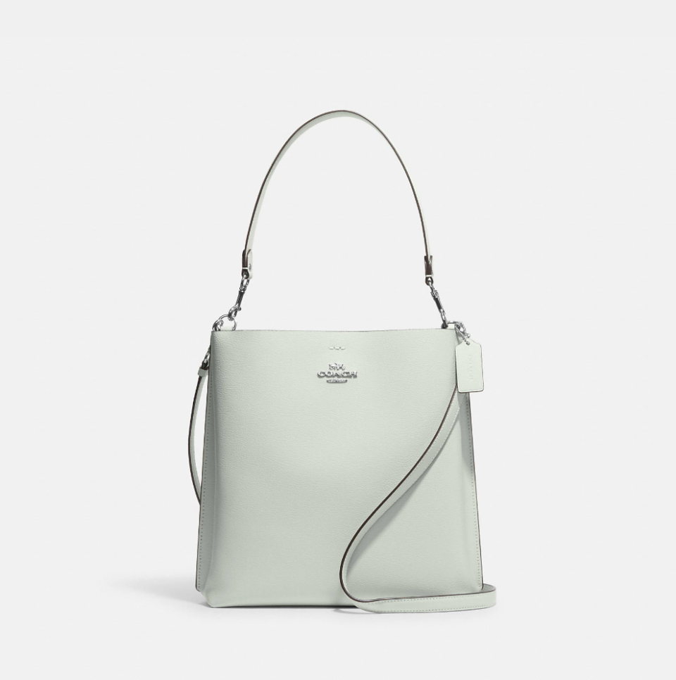 Mollie Bucket Bag in light sage (Photo via Coach Outlet)